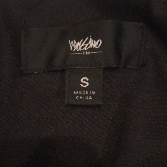 I am selling a black romper, with a fabric design - Picture 2 of 2